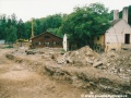 V Hlubočepské ulici probíhá demolice původních objektů v místě stoupající rampy Hlubočepské estakády. | 25.5.2002