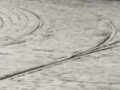 Pohled na křižovatku Karlovo náměstí od Ječné ulice v době existence přímých kolejí na trať v Resslově ulici, sjezdová výhybka je ještě tzv.symetrická trojcestná, ve vzduchu se pak kříží tramvajové a trolejbusové troleje | 15.11.1970