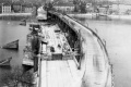 Podél Karlova mostu, pobořeného povodní ze 4. září 1890, bylo vybudováno dřevěné provizorium, na které nebyly položeny koleje. | 1891