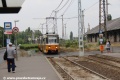 Souprava vozů T5C5 ev.č.4279+4243 vypravená na linku 12 vjíždí do prostoru zastávek Rákospalota-Újpest vasútállomás. | 25.6.2014