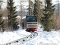 Vůz č.2 pozemní lanové dráhy Starý Smokovec-Hrebienok stoupá od dolní stanice ke středové výhybně. | 29.1.2012