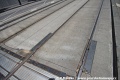 Dilatace na mostní konstrukci u Southern Cross Station. Můžete vidět, že některé tratě jsou s bezžlábkovými kolejnicemi a žlábek je vytvarován v betonové desce. | 21.11.2015