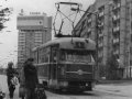 Vůz T2 ev.č.112 vypravený na linku 4 projíždí zrušenou tratí v ulici I.P.Pavlova | 1.5.1981