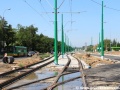 Počátkem července 2012 opuštěná trať vedoucí do konečné zastávky Junikowo. Vpravo odbočka do smyčky Budziszyńska. | 1.7.2012