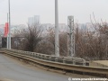 Most převádějící Nádražní ulici s tramvajovou tratí nad železniční tratí Praha - Beroun. | 27.3.2013