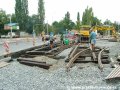 Rekonstrukce křižovatky Ohrada je v plném proudu, na místě již leží takřka celá kolejová konstrukce, s výjimkou předjízdných splítek od Vápenky a Biskupcovy. | 1.8.2006