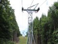Nosná podpěra č.11 lanové dráhy na Komáři Vížku obsahuje v kladkové baterii pro každé lano 6 kladek vedoucích lano. | 9.7.2012