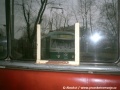 Pohled na vůz T2 ev.č.660 přes zadní sklo vozu ev.č.627, aneb pokus o umění s automatem značky krabička od mejdla | 14.2.1998