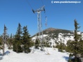 Nosná podpěra č.9 horního úseku lanové dráhy na Sněžku obsahuje v kladkové baterii pro každé lano 4 kladky vedoucí lano. | 30.4.2012