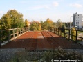 Ocelovými pláty pokrytá mostovka se zakrytým prostorem po snesených kolejnicích | 23.10.2010