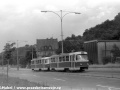 Podél budovy tramvajové měnírny uhání souprava vozů T3 ev.č.6886+6887 vypravená na linku 30 do ulice Na Mlejnku. | 3.8.1978