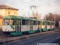 Souprava vozů T3SUCS ev.č.7141+7140 vypravená na linku 1 s odstraněnou celovozovou reklamou Koospol stanicuje v zastávce Vozovna Střešovice | 7.1.1996