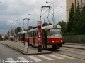 V čele pomyslné soupravy v zastávce Nádraží Holešovice odbavuje cestující vůz T3M2-DVC ev.č.8088 vypravený na linku 15, za ním trpělivě vyčkává vůz T3R.P ev.č.8563 vypravený na linku 5 | 31.5.2010