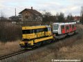 Lokomotiva 740 534-3 odváží do Plzně na železničních vozech tramvaj Škoda 14T ev.č.9111 | 9.2.2007
