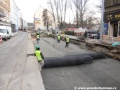 Pokládka sítí pod spodní vrstvu v Zenklově ulici. | 28.3.2011