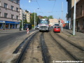 Asfaltování vozovky podél velkoplošných panelů BKV v oblouku nad zastávkou VOsmíkových. | 12.4.2011